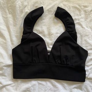 Black plunging neck line top